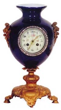 French clock in a blue cobalt urn, standing 15 inches high. — Antique Clocks Price Guide