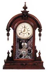 Wm. L. Gilbert walnut, "Parisian", ca 1879. The case is 24 inches high, extremely clean and highly polished. — Antique Clocks Price Guide