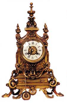 French bronze mantle clock with heavy ornamentation, lions, spires, and other cast figures. — Antique Clocks Price Guide