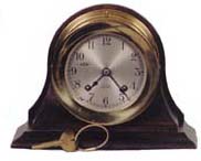 Chelsea Clock Co. ships bell with display case, 6 1/4 inches high and 8 1/4 inches wide. — Antique Clocks Price Guide