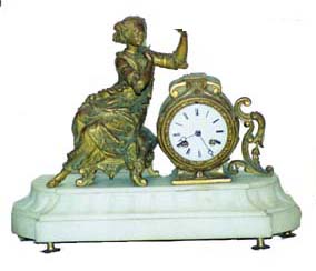 French bronze and onyx statue clock. 8 day, bell strike movement with outside count wheel, signed "Ketterer-Paris". — Antique Clocks Price Guide