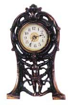 Standing novelty clock, 9 1/2 inches high. — Antique Clocks Price Guide