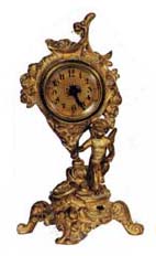 Jennings Bros. large novelty, 13 inches high. 30 hour movement is running. — Antique Clocks Price Guide