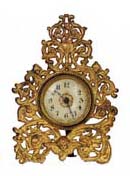 Western Clock Mfg. Co. novelty with easel stand. — Antique Clocks Price Guide
