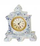 Ansonia Clock Co. blue delf porcelain case. Extra fancy with attached flowers and leaves on the front like the Meisen china clocks. — Antique Clocks Price Guide