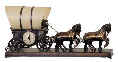 United Clock Co. "Covered Wagon" clock, 19 1/2 inches wide,10 inches high. — Antique Clocks Price Guide