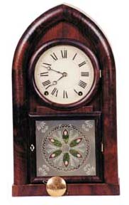 Terry & Andrews, East Bristol, Conn., per the label on this early beehive clock. — Antique Clocks Price Guide