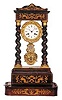 French Empire Portico mantle clock with rope columns.