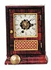 Daniel Pratt & Sons miniature cottage clock, 9 inches high.