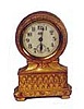 Jennings Bros. novelty clock in a rich Roman gold plated case that is 4 1/2 inches high.