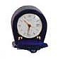 Miniature Swiss travel alarm clock in a leather travel case, 2 1/2 inches high.