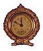 Jennings Bros. novelty clock. 3 3/4 inch case finished in rich Roman ormolu gold, about half gone.