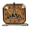 Lux Clock Co. animated novelty alarm clock. Ticking of clock turns the spinning wheel and foot petal.