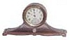 Benedict Mfg. Co., movement by Waterbury Clock Co., tambour style bronze case is 7 inches wide, 3 1/2 inches high.