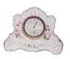 New Haven miniature china clock, has no case damage.
