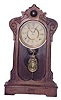 E. Ingraham Clock Co. walnut parlor. 8 day movement strikes on a cathedral gong.