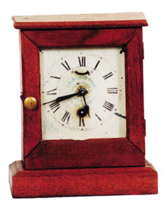 Waterbury Clock Co. mini advertising clock. — Antique Clocks Price Guide