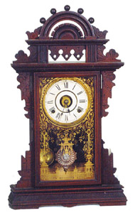 Seth Thomas Clock Co. shelf clock, "Eclipse" or "Balltop" model. — Antique Clocks Price Guide