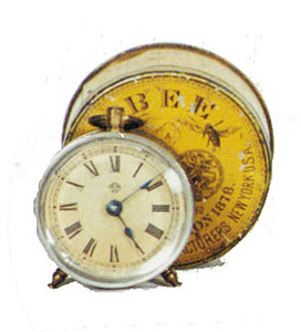 Ansonia Clock Co. novelty, "Bee" in original yellow tin shipping container, ca 1906. — Antique Clocks Price Guide