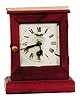 Waterbury Clock Co. mini advertising clock.