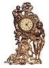 Novelty shelf clock, stamped "Wild Rose" on the 13 inch metal case.
