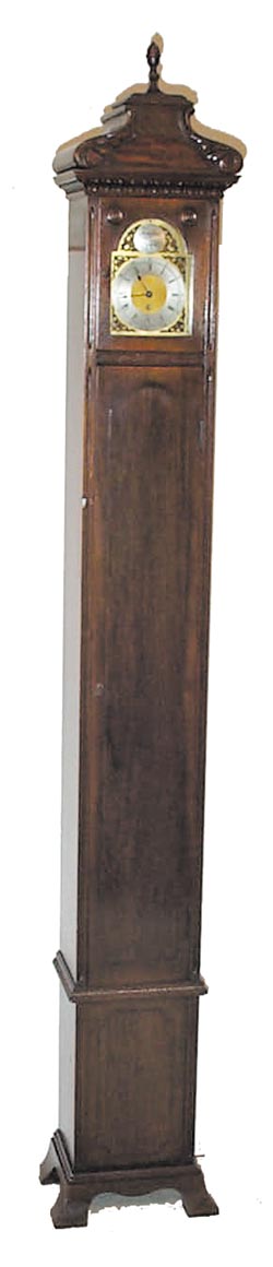 Colonial Mfg. Co., hall clock, ca 1929. Model No. 1410, and so stamped on the back of the 68 inch high case. — Antique Clocks Price Guide