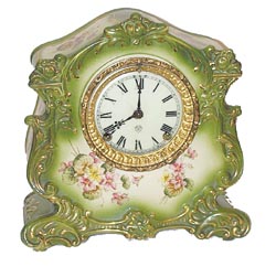 Ansonia Clock Co. Royal Bonn porcelain case, "Weasel", ca 1901. — Antique Clocks Price Guide
