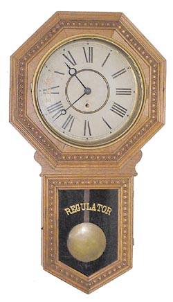 Wm. L. Gilbert Clock Co. hanging clock, "Consort", ca 1910. — Antique Clocks Price Guide