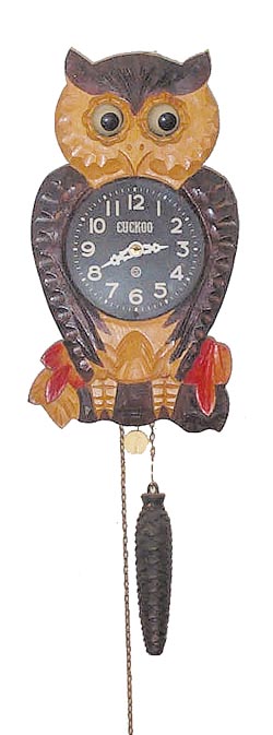Japanese moving eye "Owl" clock. — Antique Clocks Price Guide