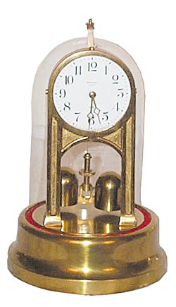 Tiffany Electric Mfg. Co. torsion pendulum "Never-Wind", clock, ca 1918. — Antique Clocks Price Guide