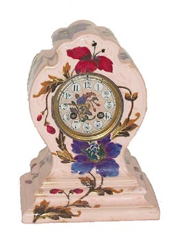 French porcelain clock with an unsigned round, 8 day, French movement. — Antique Clocks Price Guide