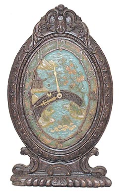 "Blossom Time", table art clock. — Antique Clocks Price Guide