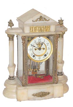 Ansonia Clock Co., crystal regulator with white onyx top, base, and columns, called the "Gonfalon", ca 1906. — Antique Clocks Price Guide