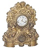 Mueller case with a metal front, Waterbury Clock Co. movement and full label.