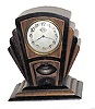 National Magnetic Clock Co., "Torsion Pendulum", art deco style with a disc pendulum.