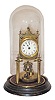 German Anniversary clock, disc pendulum, with a rare wood base.