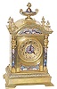 French brass and cloisonne table clock.