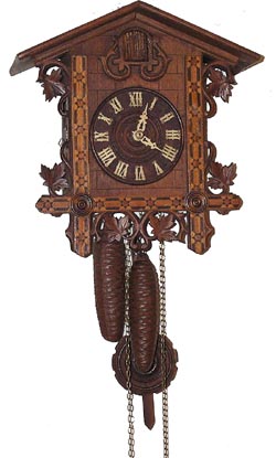Miniature 30 hour cuckoo in the poplar style that uses an inlayed wood front. — Antique Clocks Price Guide
