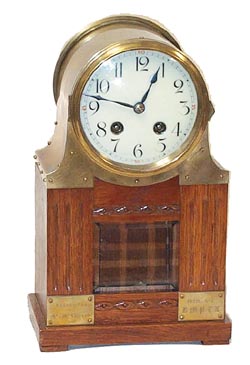 Hamburg American Clock Co. is the trademark on the 8 day movement. — Antique Clocks Price Guide