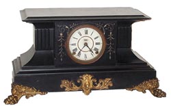 E. Ingraham Clock Co. mantle clock, enameled wood cased, "Magnolia", ca 1891, the Granddaddy of all blacks. — Antique Clocks Price Guide