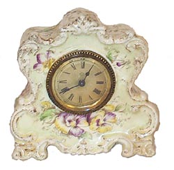 Ansonia Clock Co., porcelain case, "Bobwhite", ca 1895. — Antique Clocks Price Guide