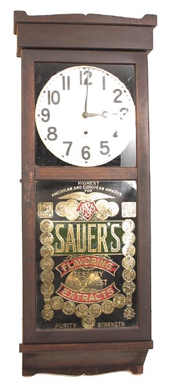 New Haven Clock Co., hanging clock, with one of the famous SauerÕs advertising glasses. — Antique Clocks Price Guide