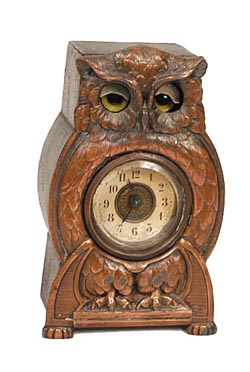 Early animated owl clock. Eyelids blink as the clock ticks. — Antique Clocks Price Guide