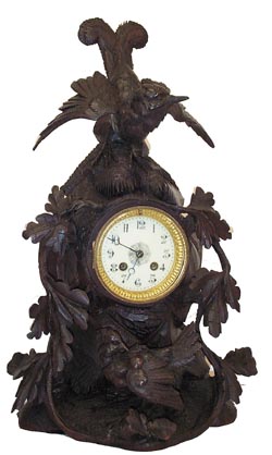 Early carved shelf clock, French 8 day round movement, so typical of French movements, strikes a nickel bell on half hours, has an outside count wheel, and is signed by A.G. Mougin. — Antique Clocks Price Guide
