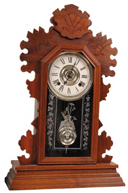 Ansonia Clock Co., walnut kitchen clock, "Beaver", ca 1894. — Antique Clocks Price Guide
