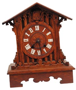 Shelf Cuckoo only 13.25" high, in a rather plain case. — Antique Clocks Price Guide