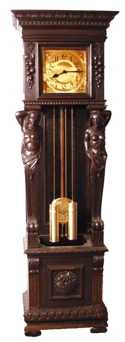 German heavily carved oak case tall clock. — Antique Clocks Price Guide
