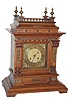 German shelf clock, made by "Thomas Haller", a clockmaker in Schwenningen Germany, from 1880 until 1900, when they merged with Junghans. Their trademark "T over H" is on the movement.