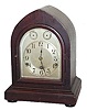 The Kienzle Clock Co. New York, Westminster Chime movement in a beehive style case, 13 inches high.