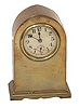 Waterbury Clock Co. novelty called the "Amon", ca 1912. Smallbrass case is 5 inches high, 2 inch celluloid dial with seconds dial.